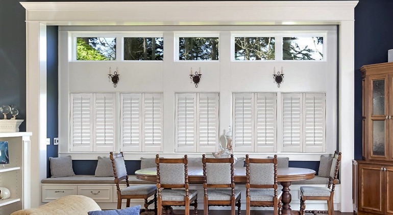 Fort Myers great room with white plantation shutters.